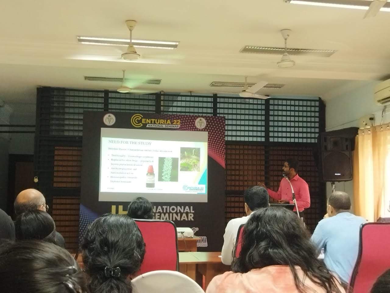 Dr. Aghosh presenting a paper at Centuria 2K22