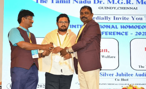 Dr. Tejas Vikas Receiving Award